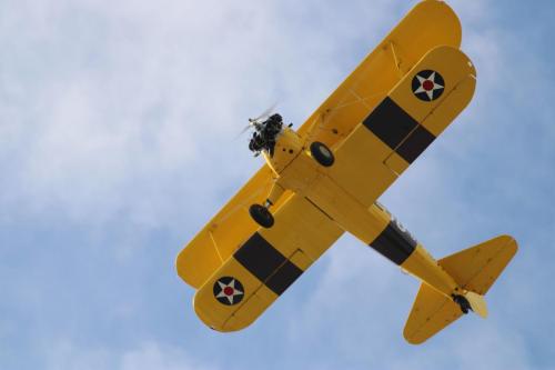 Stearman overflying the hanger during the event
