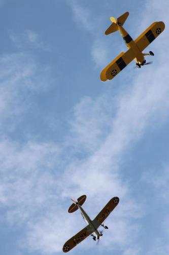 Beautiful vintage aircraft overflying the EAA hanger